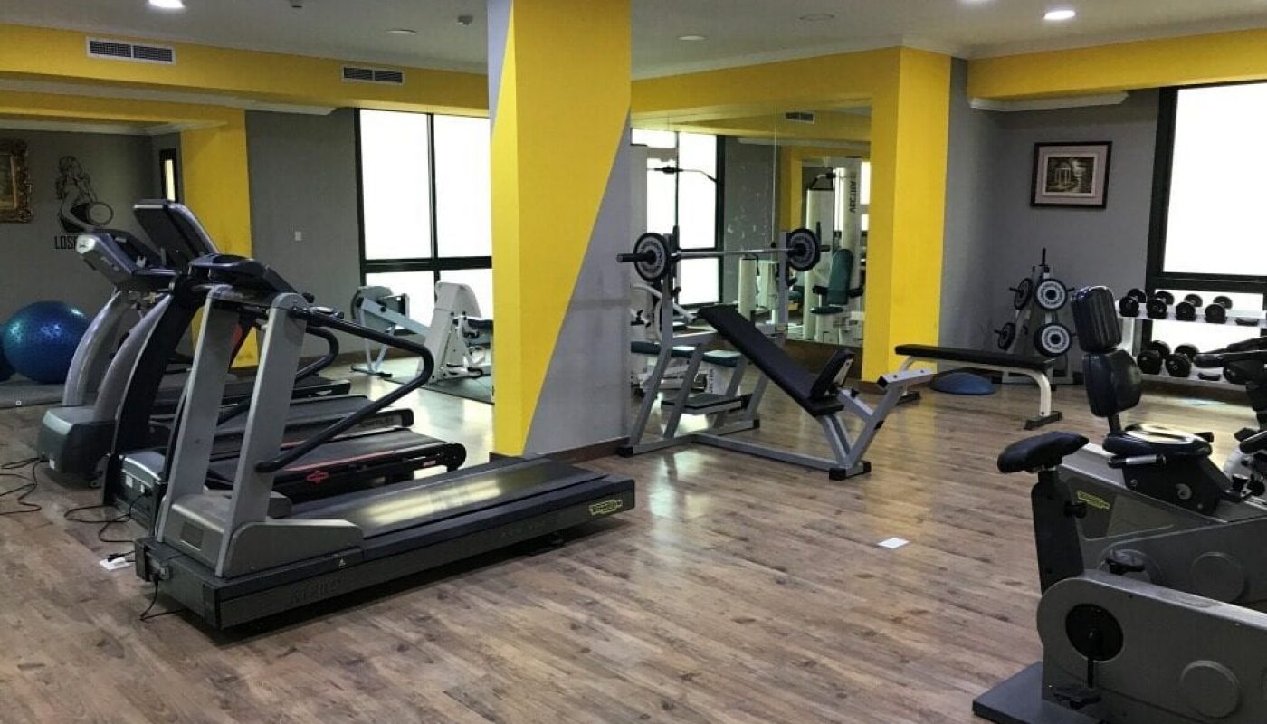 Elevate your living experience with a dream home that includes a room equipped with exercise equipment.