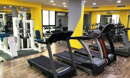 Elevate your living experience in Juffair with a room equipped with treadmills and exercise equipment.