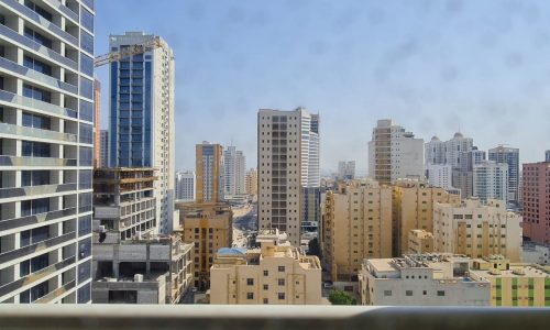 A luxurious view of the city from the balcony of a tall building.