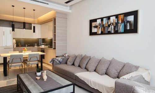 A modern apartment with a living room and kitchen area, fully furnished and with amazing facilities for rent in Juffair.