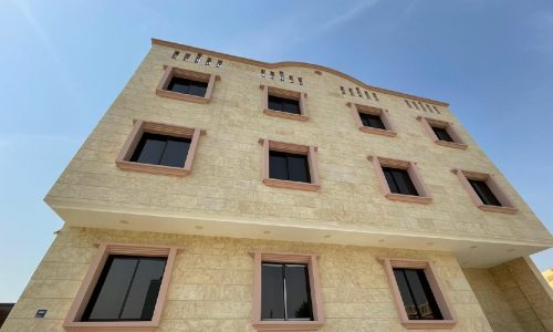 A brand new flat in Buhair with beautiful windows and balconies on a sunny day.