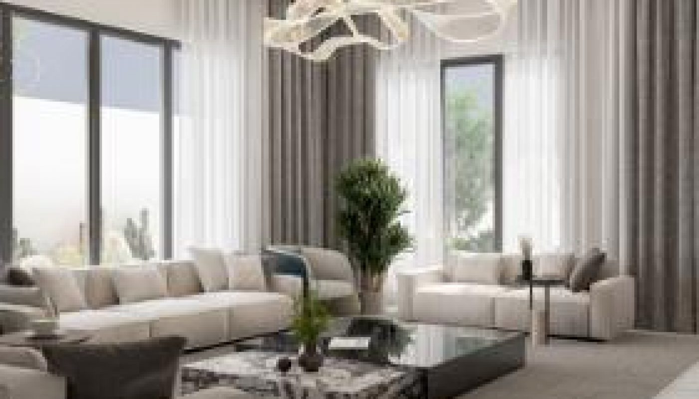 Modern living room with neutral tones, large windows, two sofas, a glass coffee table, abstract chandelier, and indoor plants. Natural light fills the space.