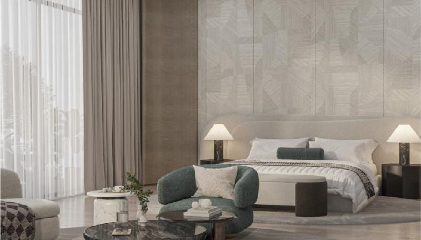 Modern bedroom with a large bed, round rug, marble coffee table, curved seating, neutral tones, and a large window with sheer curtains.