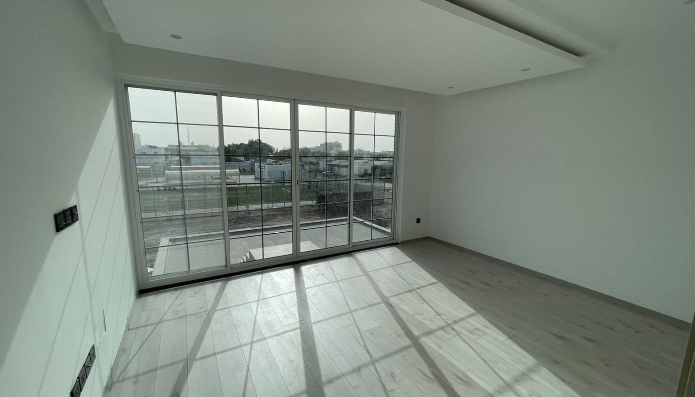 A luxurious villa with 5 spacious bedrooms and a sliding glass door in each room.