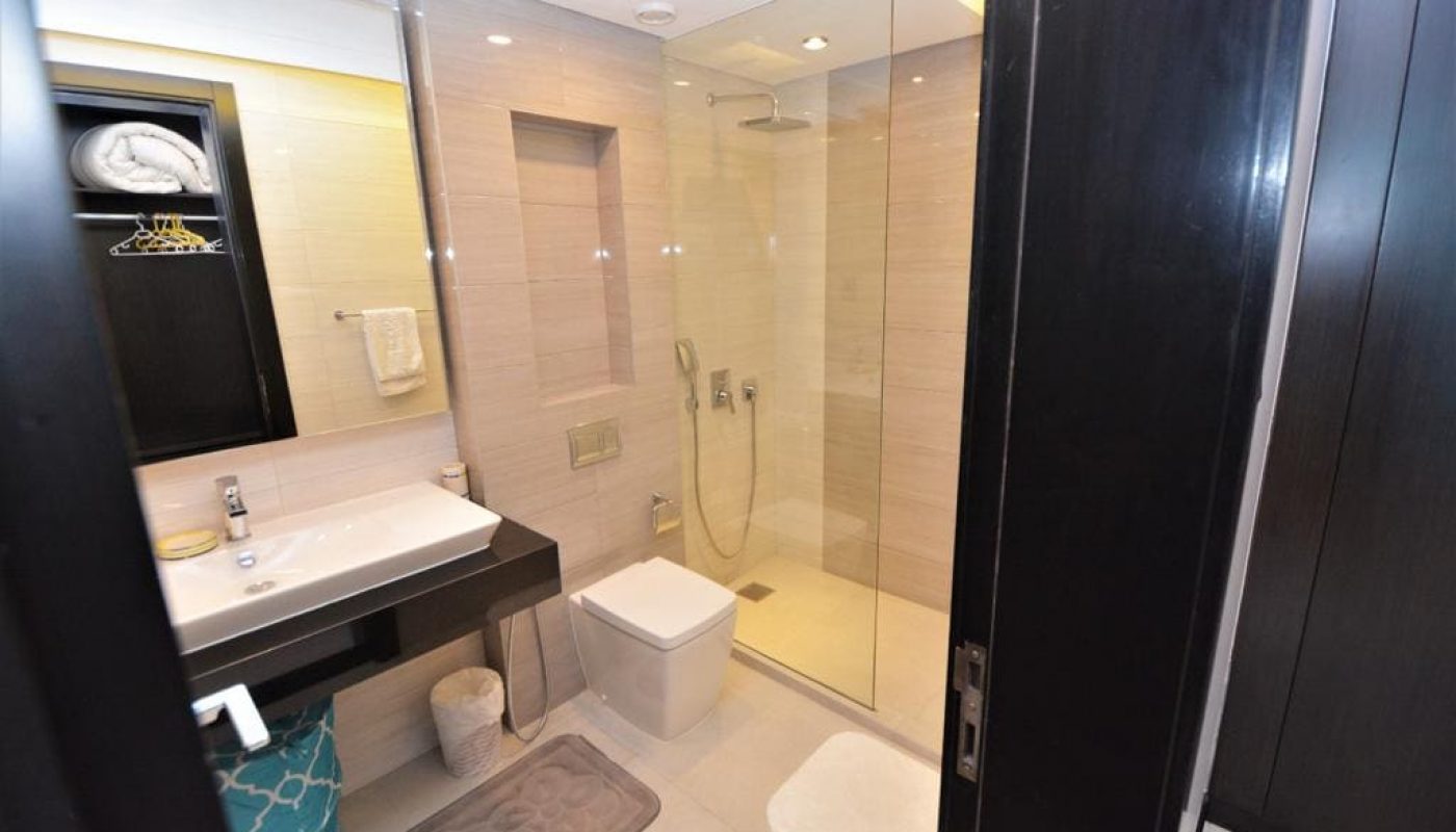 An exquisite bathroom with a shower and sink.