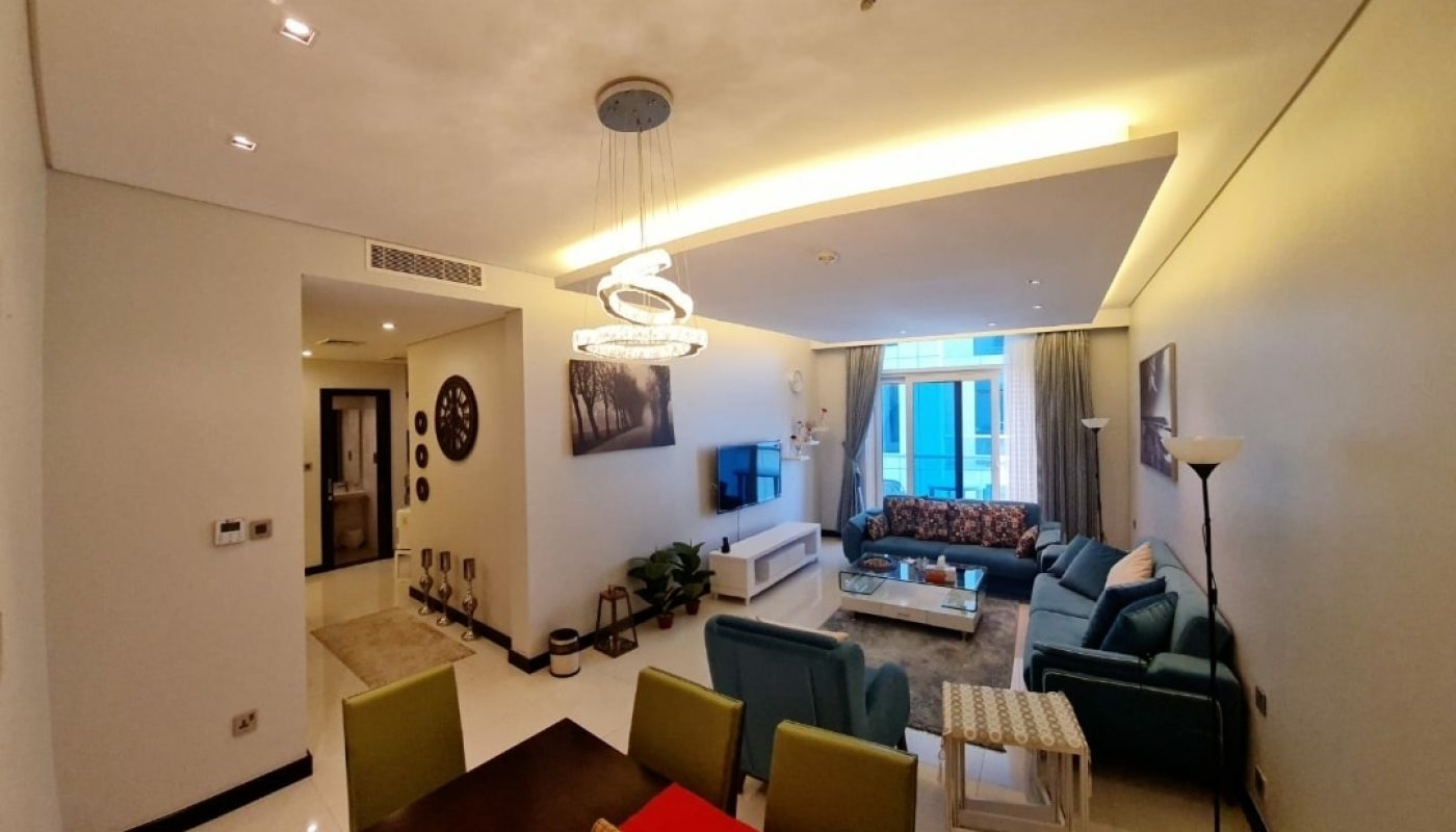 A modern living room and dining room in an amazing apartment for rent.