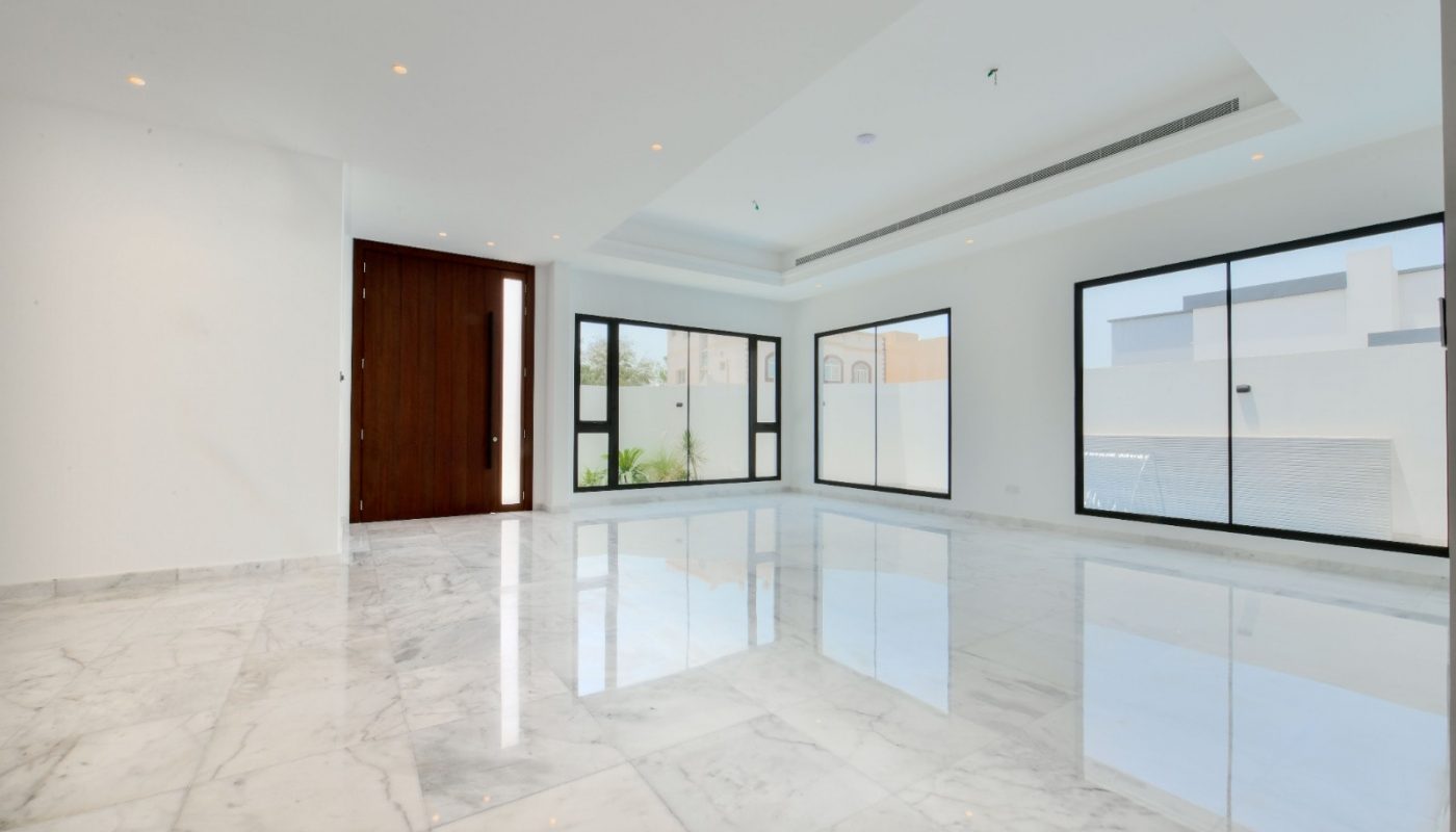 Modern villa with marble floors and large windows for sale.