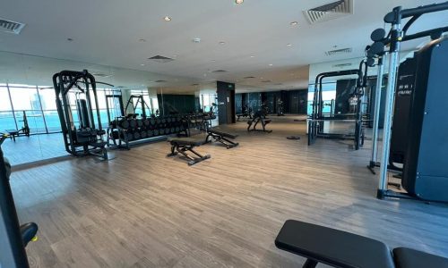 A gym with weights and machines in a large room, located in Juffair.