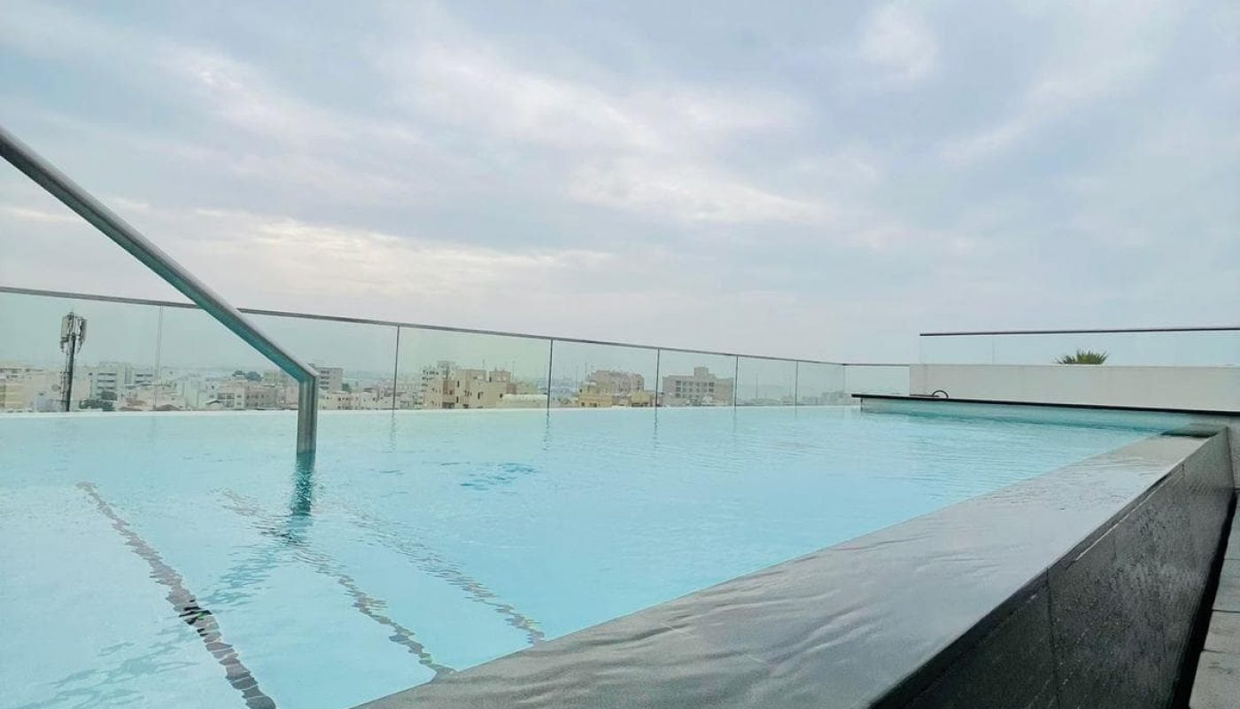 A stylish apartment with a rooftop swimming pool overlooking the city available for rent.