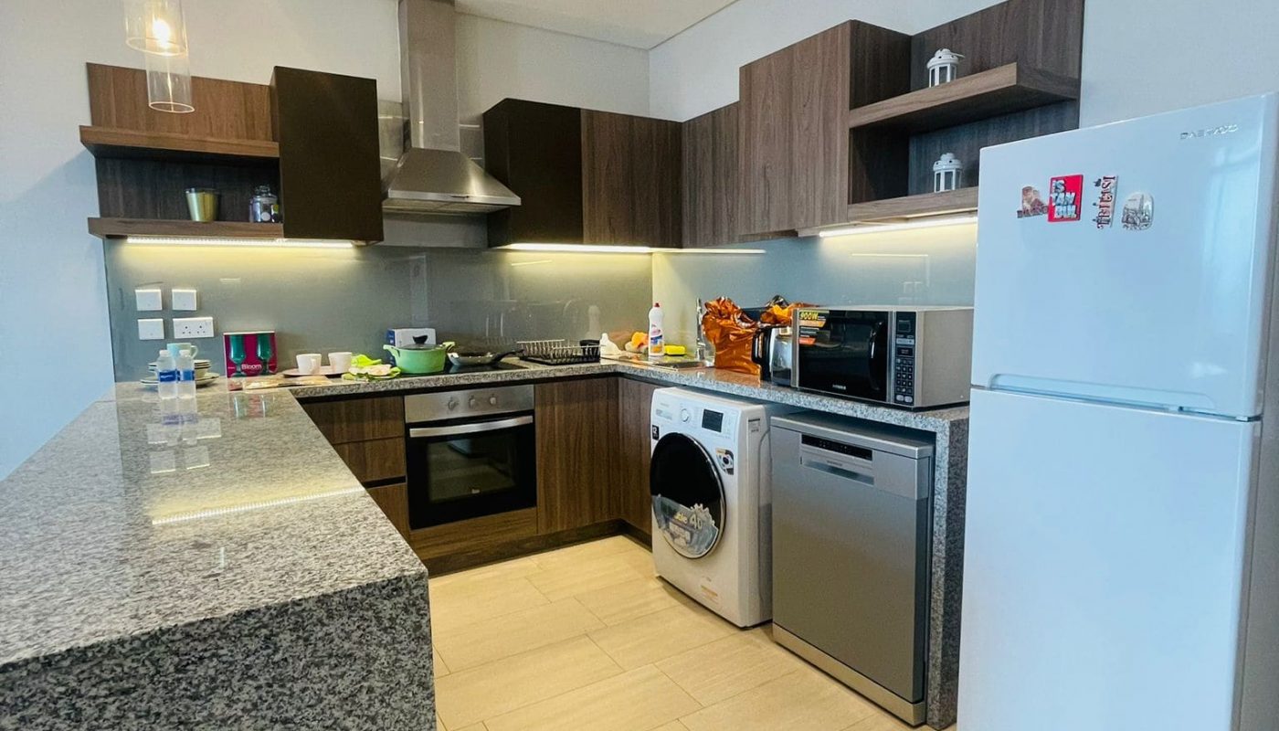 Seef, Luxury kitchen with stainless steel appliances and granite counter tops.