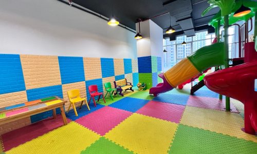 A luxurious children's play area with colorful toys and a slide.