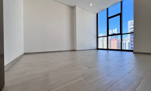 A luxury apartment with wooden floors and a view of the city, located in Juffair, now available for sale.