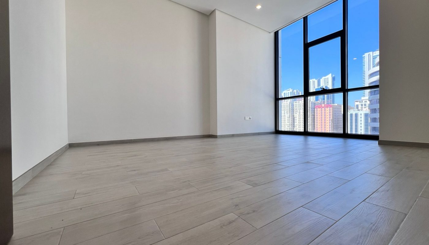 A luxury apartment with wooden floors and a view of the city, located in Juffair, now available for sale.