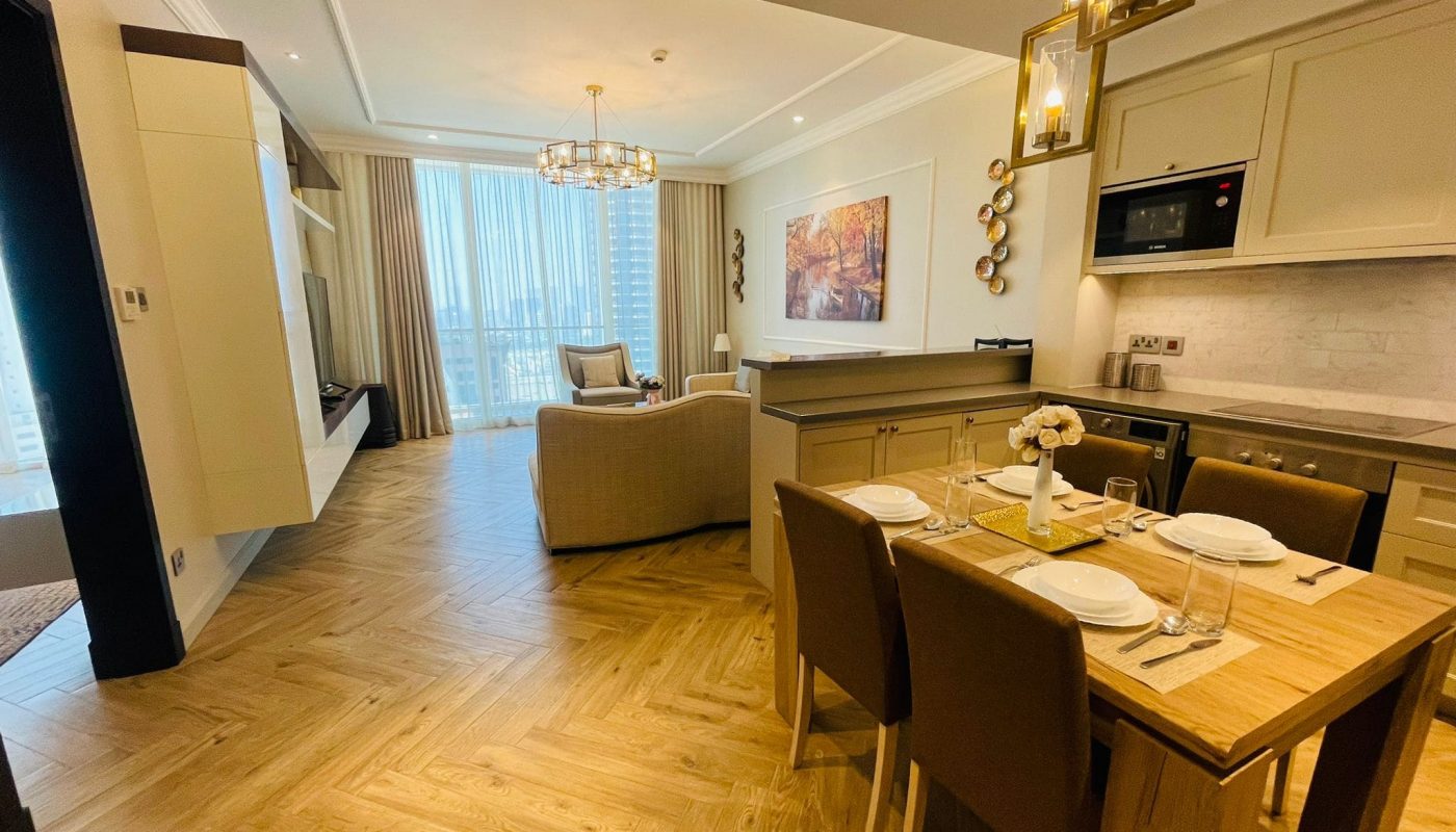 A kitchen and dining area in a modern apartment.