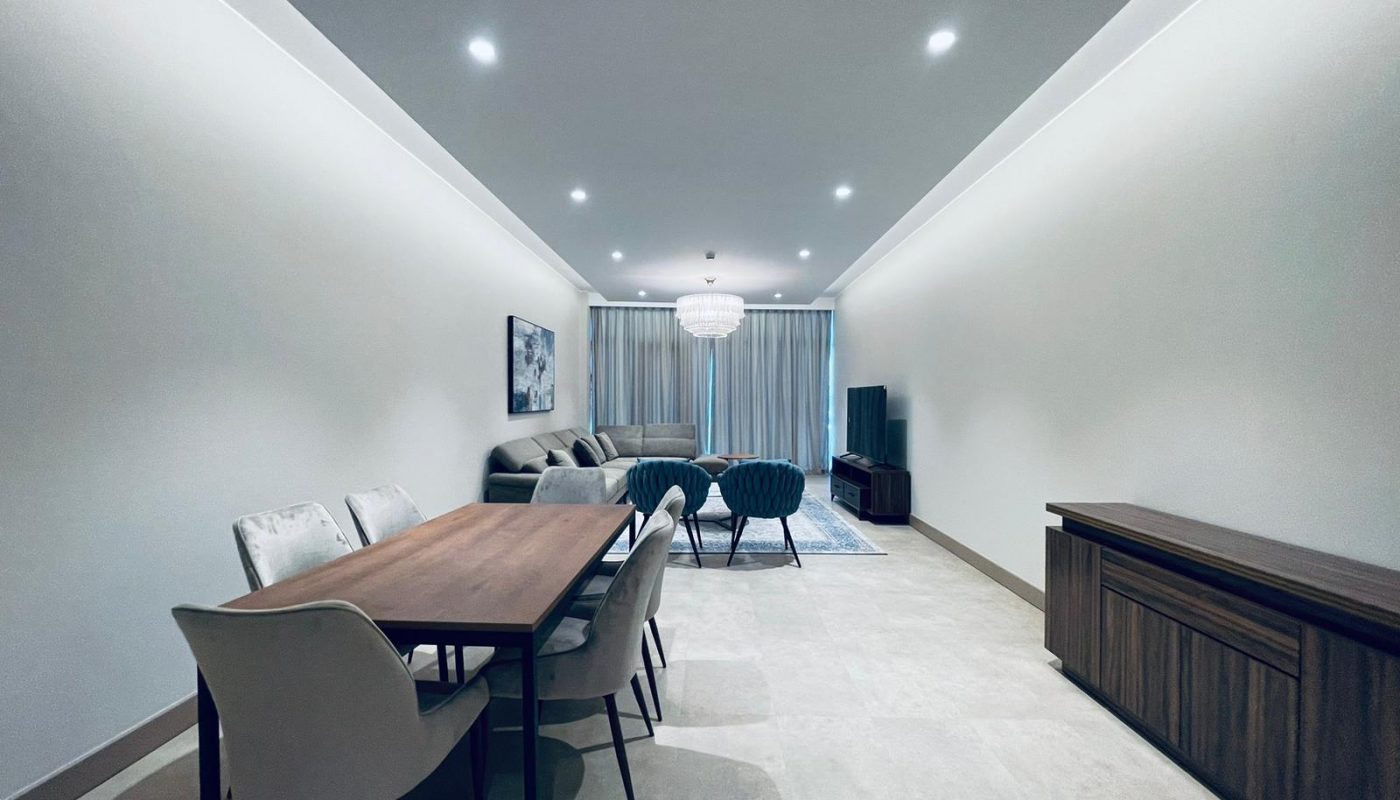 A living room with a dining table and chairs for keyword-optimized home decor.