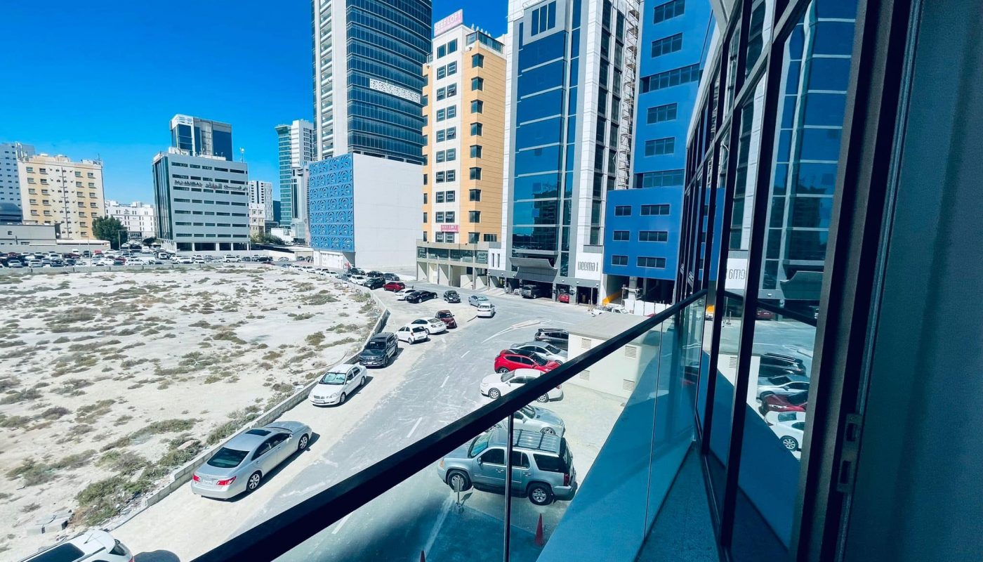 A view of parked cars in a parking lot.