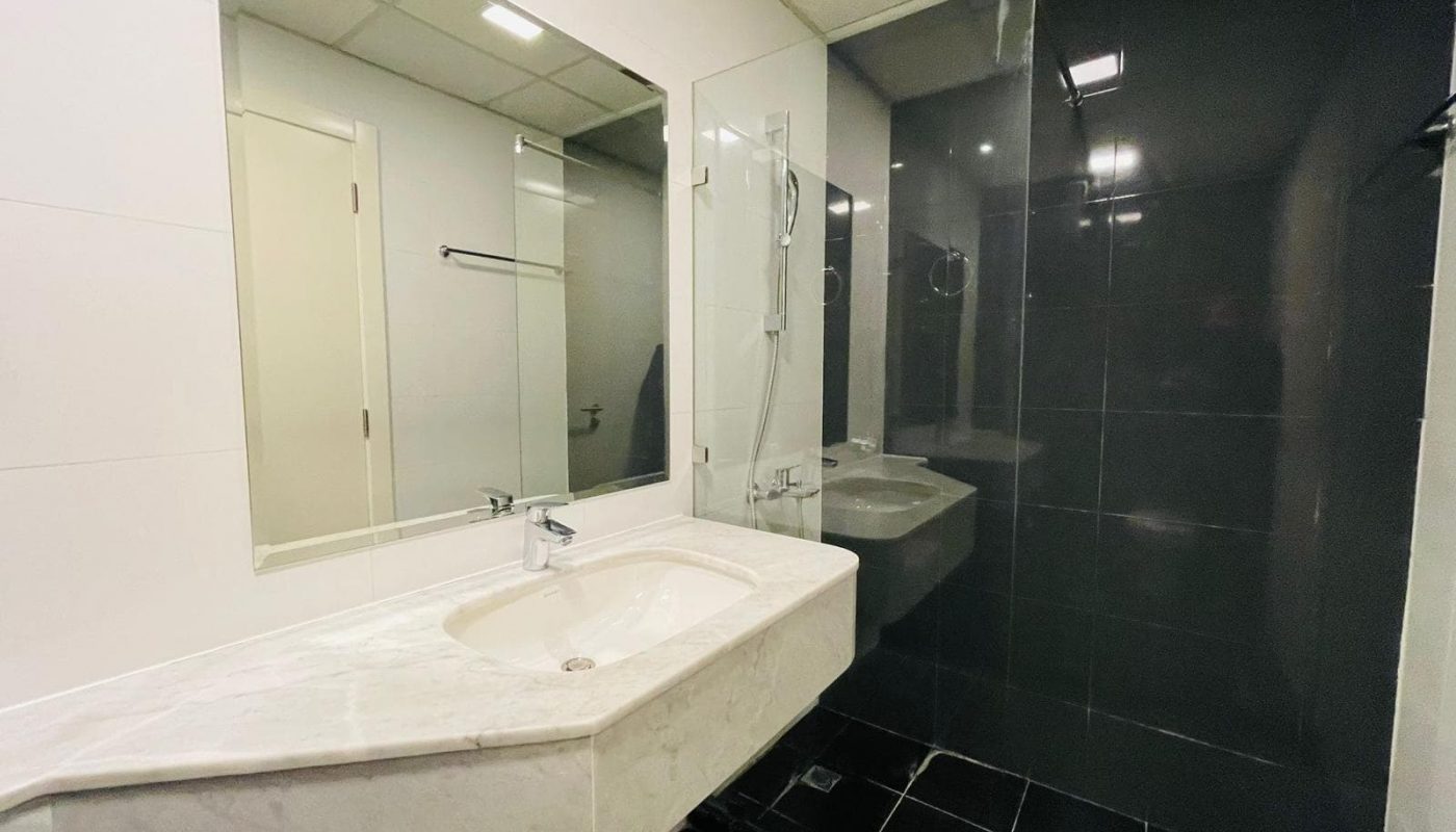 Modern bathroom interior with a sink, mirror, and Auto Draft shower area.