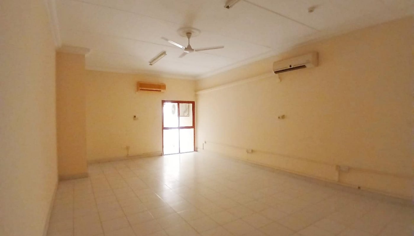 Empty room with tiled floor, cream walls, a ceiling fan, an air conditioning unit, and an auto draft system.