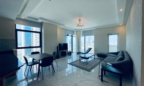 Modern living room in a luxury apartment in Sanabis with elegant furniture, large windows, and a city view.