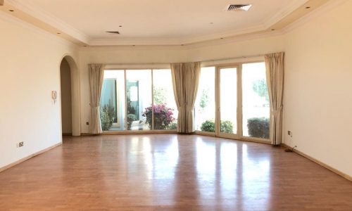 Luxury living room with sliding glass doors.