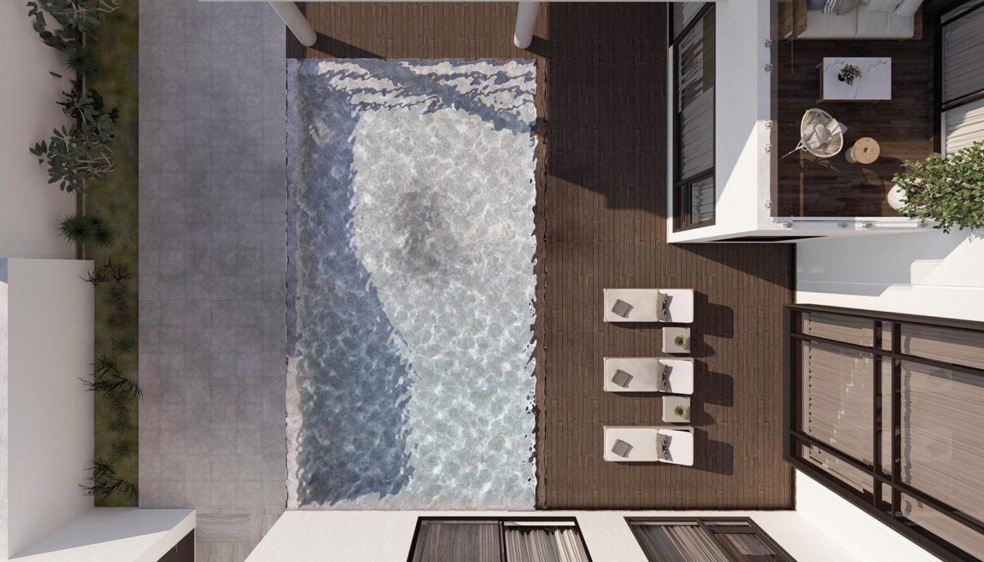 Aerial view of a modern rectangular courtyard with a swimming pool, wooden deck, three lounge chairs, potted plants, and an outdoor dining area.