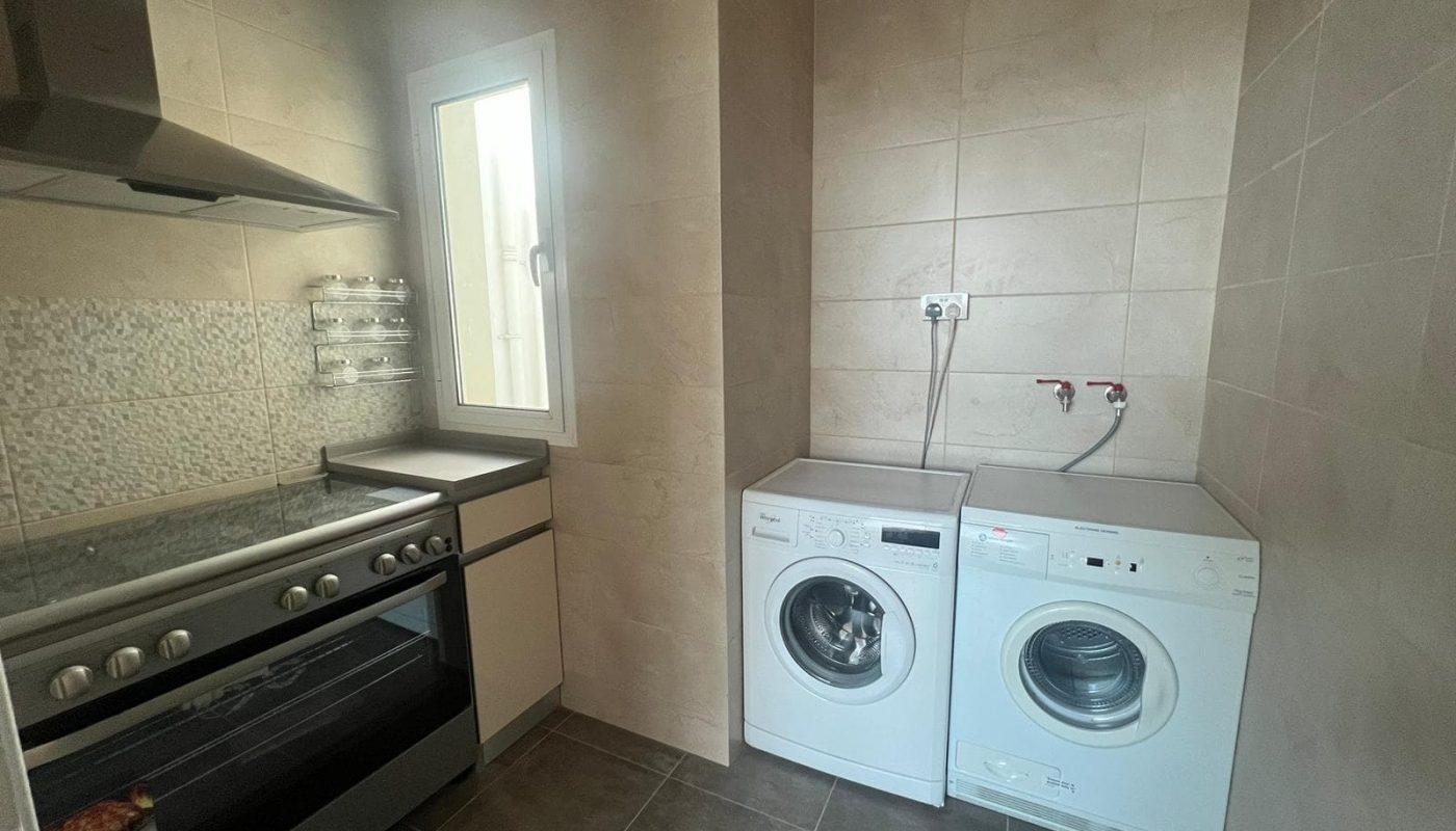 Modern 3BR Apartments for Sale in Hidd with small kitchen.