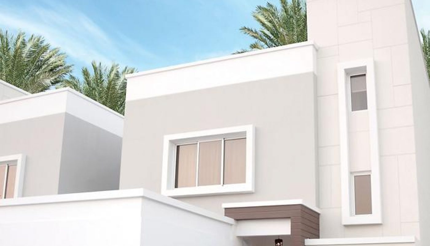 Modern two-story villa in Diyar Al Muharraq with flat roof design, featuring a garage and a wooden front gate, situated under clear skies with palm trees nearby.