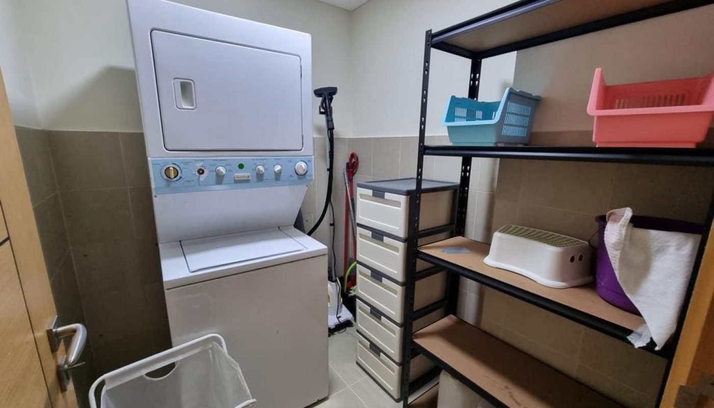 Immaculate laundry room with a washer and dryer.