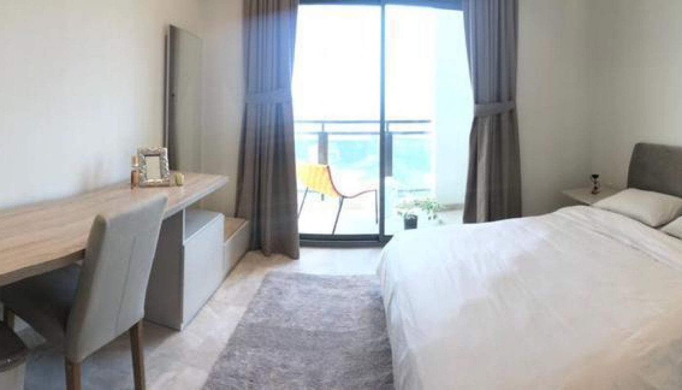 A Luxury Apartment with a bed or beds in a room for Sale at Busaiteen.