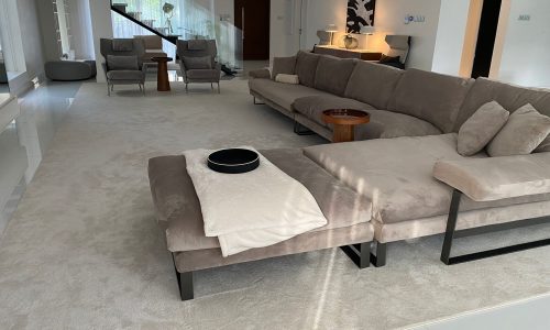 A modern designed living room in a fully furnished villa.