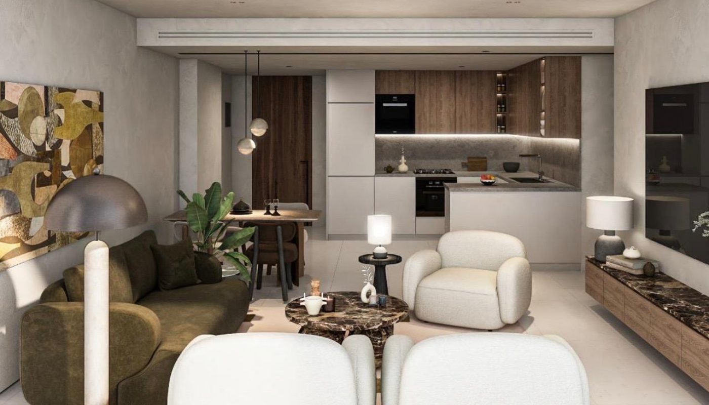 Open-plan living space with modern kitchen, dining area, and seating area featuring neutral tones, contemporary furniture, and minimalist decor.