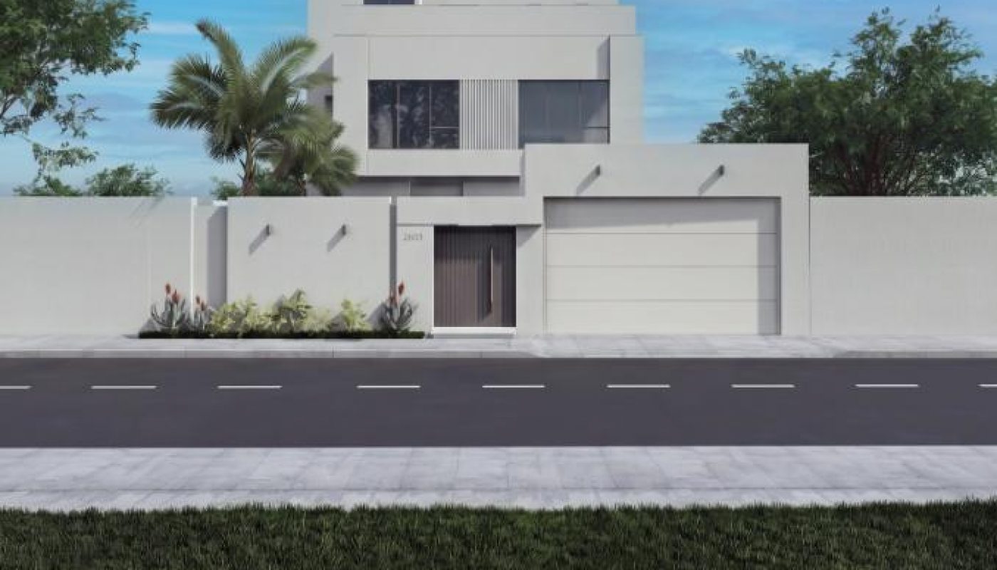 Modern two-story white house with a flat roof, attached garage, and minimalist landscaping, set behind a white wall along a paved street under a blue sky with scattered clouds.