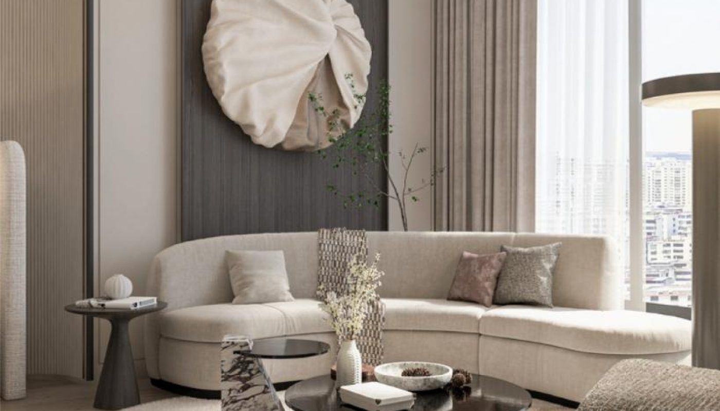 Modern living room with a curved beige sofa, abstract art on the wall, round coffee tables, neutral tones, and floor-to-ceiling windows with city view.