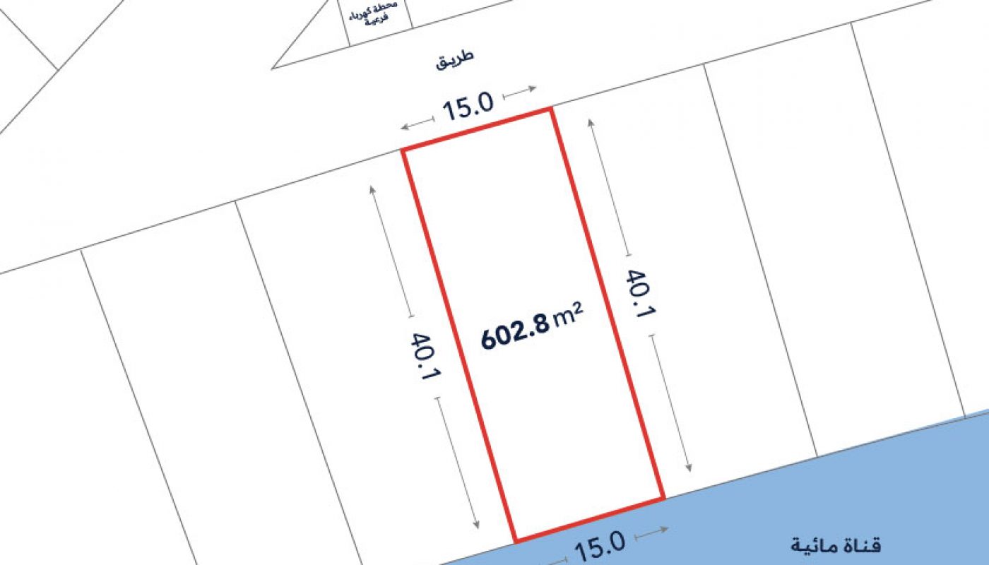 A plot of land outlined in red, labeled 602.8 m², measures 15m by 40.1m, bordered by a road on one side and a water channel on the other.