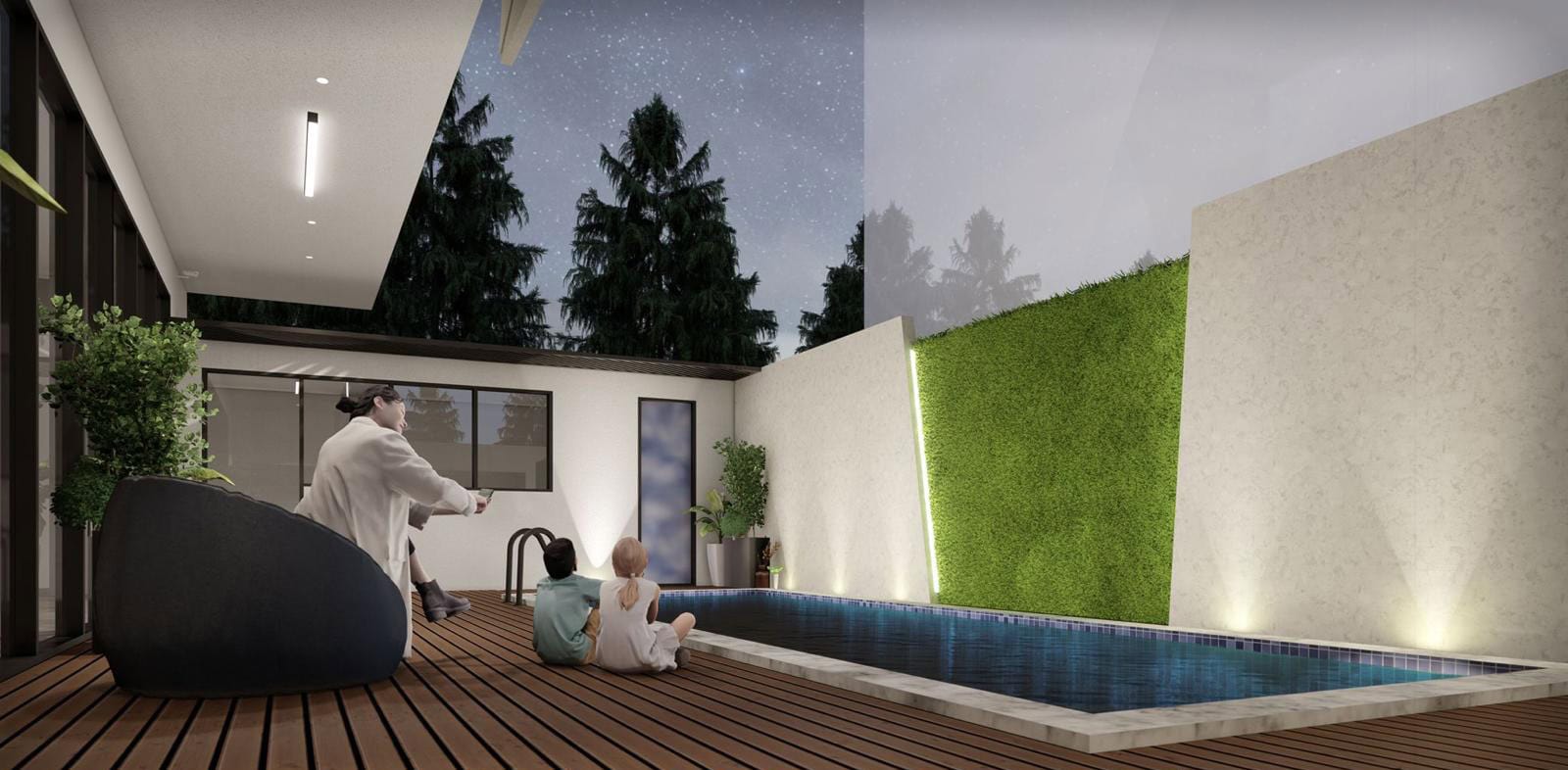 Two people sit near a rectangular pool on a wooden deck at night, surrounded by greenery and modern architecture.